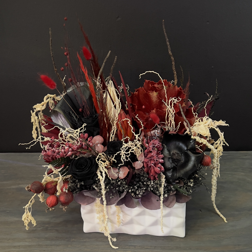 black forever roses and red accent preserved floral arrangement from bloombudz in Paragould, AR