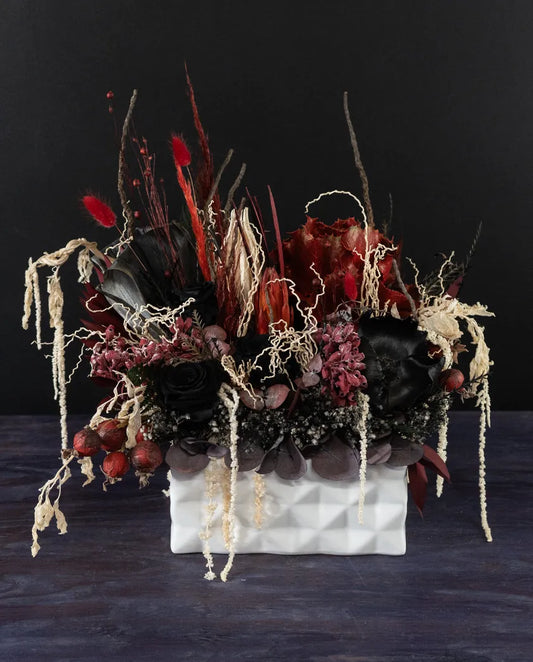 black forever roses and red accent preserved floral arrangement from bloombudz in Paragould, AR