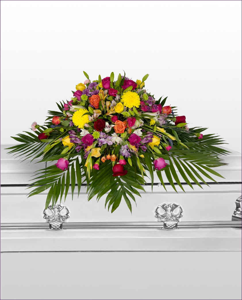 Colorful Celebration casket spray from bloombudz in Paragould, AR